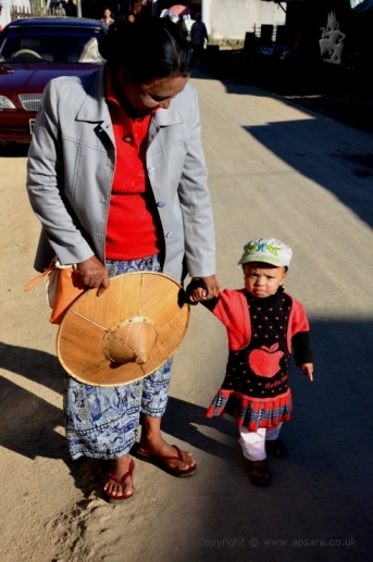 A dealer at the Pan Ma Gem Market with her daughter